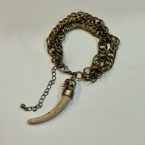 Silver Toned Chunky Double Layer Bracelet With Large Faux Elephant Tusk Charm